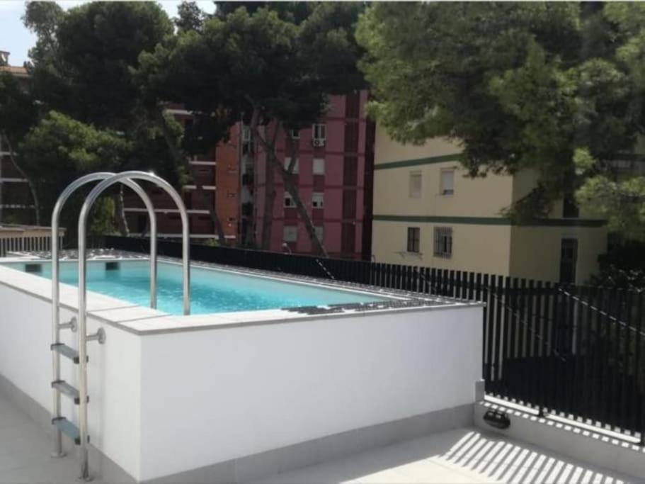 Modern Wave Escape Apartment With Private Parking And Rooftop Pool By Namaste Elite توريمولينوس المظهر الخارجي الصورة